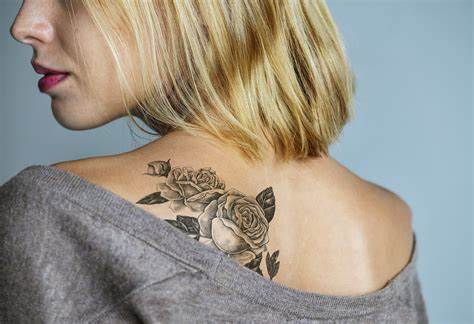 Woman with tattoo on her back